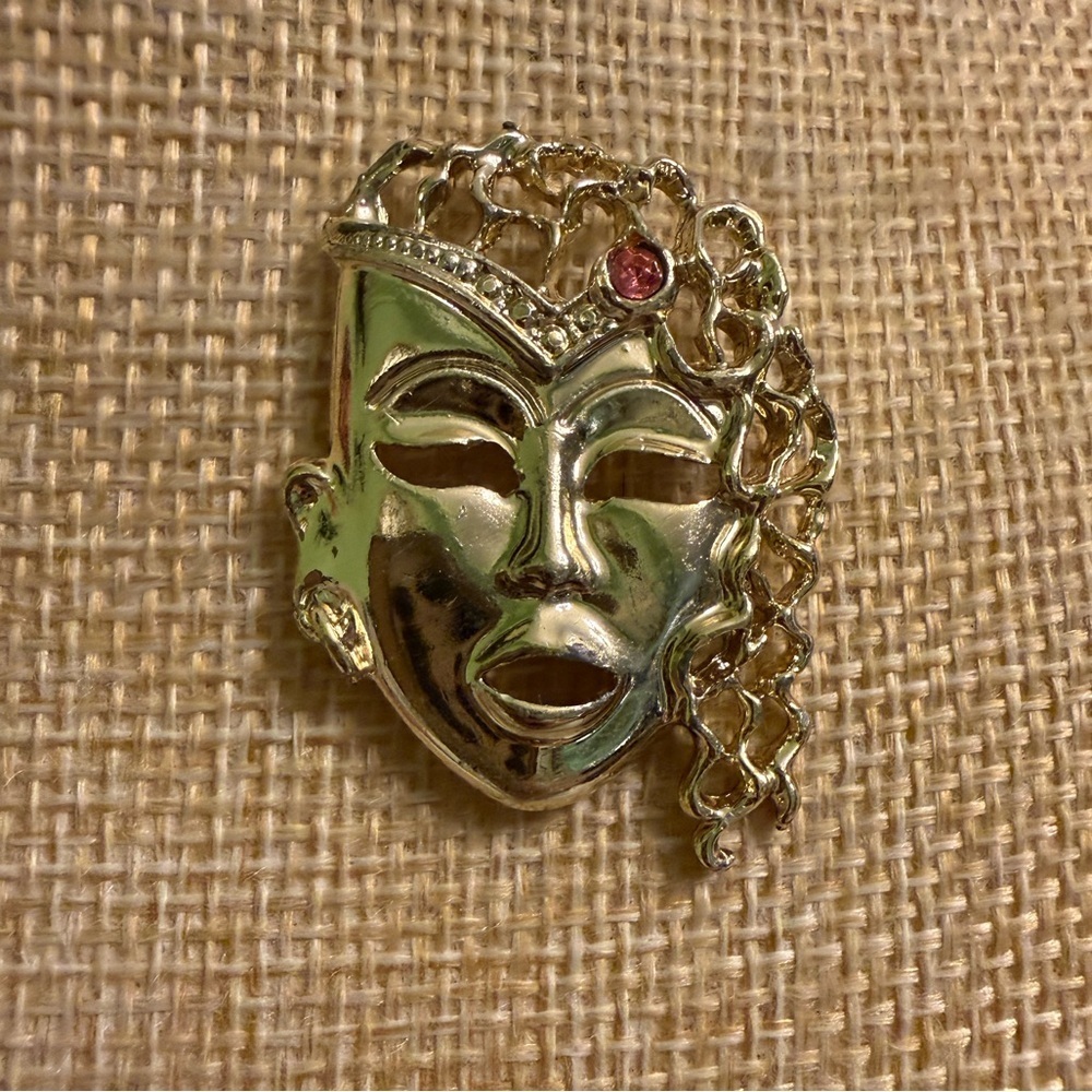 Gold Face Brooch with Red Accent